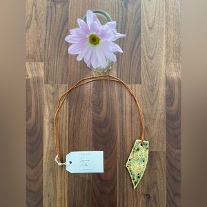 Handmade clay pendant, yellow/green/brown colors mixed